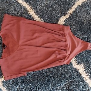 Dark rose colored, short sleeve body suit